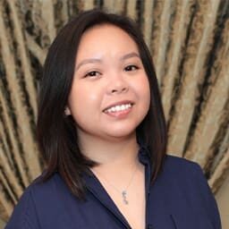 Close up shot of a beautiful lady smiling at the camera